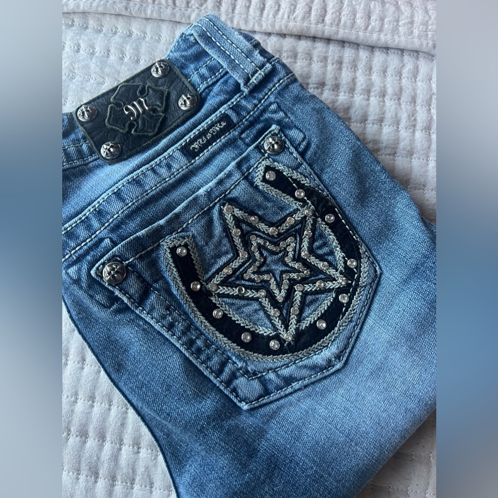 Low Waisted Boot Cut Jeans. Size 27 Long